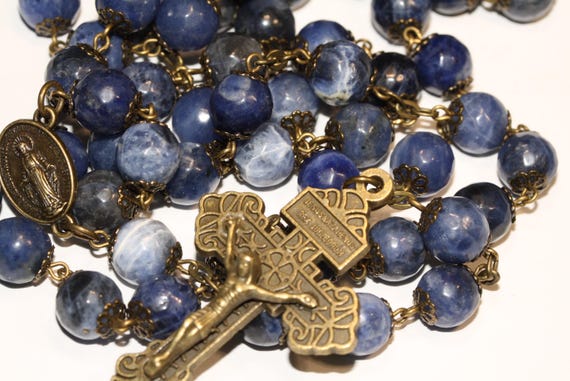 10mm Faceted Sodalite in Bronze with a Pardon Crucifix handmade in Oklahoma