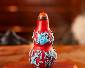 Boccetta per tabacco da fiuto in zucca Liuli realizzata a mano, con intagli in turchese rosso e tappo in agata.