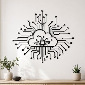 May include: A black metal wall art piece featuring a central cloud shape integrated with a complex network of circuit board lines, nodes, and two square microchip components, creating a symmetrical electronic design on a flat surface.