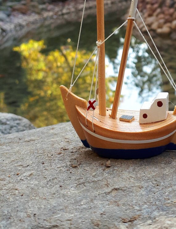 small wooden toy boat