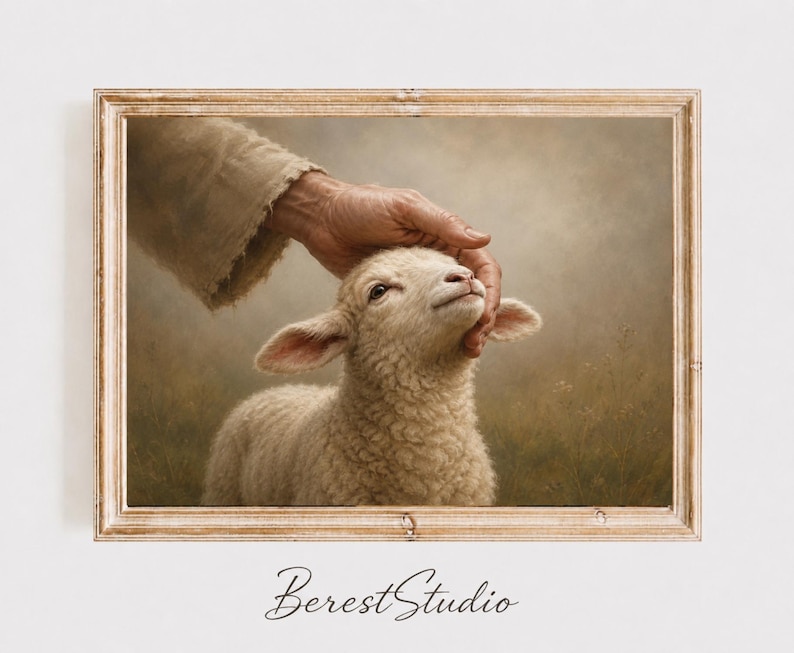 May include: A framed wall art print featuring a textured illustration of a hand in a beige sleeve gently touching the head of a white lamb. The lamb has soft, curly wool and is looking upward. The background is a muted, hazy field in soft brown tones.
