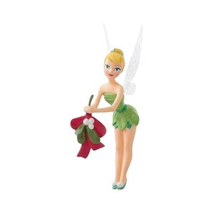 May include: A figurine of a blonde fairy with translucent glittery wings, wearing a green leaf-style dress. The fairy is holding a sprig of mistletoe with white berries and a red bow, featuring a light skin tone and blue eyes in a standing pose.