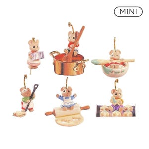 May include: A set of six miniature mouse ornaments with gold-tone hanging loops. The figures depict mice engaged in kitchen activities, including cooking with a pot, mixing in a bowl labeled 1994, sweeping, rolling dough, and baking cookies. The text MINI is visible.