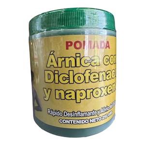May include: A jar of topical ointment with a green lid and a yellow label. The label reads "POMADA Árnica con Diclofenac y naproxen" and "CONTENIDO NETO 250 GRS". The jar is on a white background.