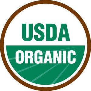 May include: A circular USDA Organic seal with a brown border. The top half of the circle is white with the word "USDA" in green block letters. The bottom half is green with the word "ORGANIC" in white block letters.