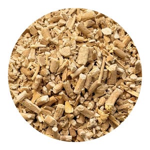 May include: A close-up shot of a collection of light brown, chopped wood pieces, bark, and stems. The pieces are of varying sizes and shapes, some cylindrical and others irregular. The background is plain white.