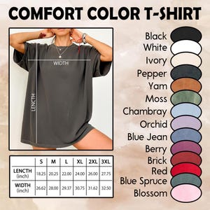 May include: A dark gray Comfort Color T-shirt is displayed, with measurements for length and width in inches. Color options include black, white, ivory, pepper, yam, moss, chambray, orchid, blue jean, berry, brick, red, blue spruce, and blossom.