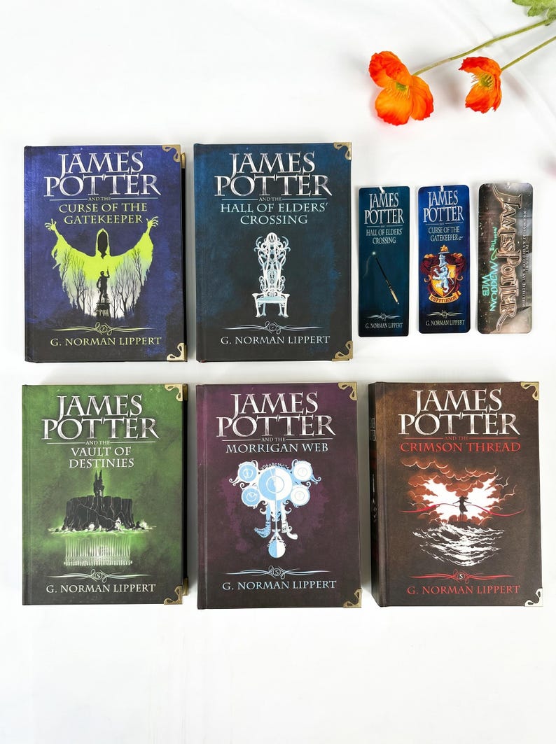 May include: Five hardcover books titled James Potter by G. Norman Lippert with distinct cover art in blue, green, purple, and brown, accompanied by three matching vertical bookmarks featuring character and title graphics, all arranged on a white surface.