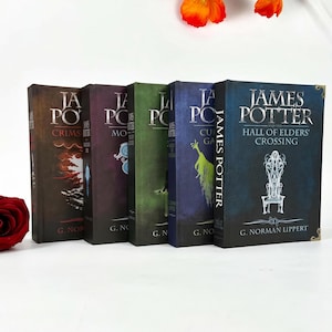 May include: A set of five James Potter books by G. Norman Lippert arranged in a row. The covers feature distinct colors including brown, purple, green, dark blue, and black with white text and illustrations of a throne and other graphic elements.