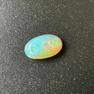 Crystal Opal full color flashes 3.59 ct collectors item real opal from Welo mine and stableized perfect ring size and personally hand picked