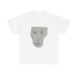 May include: White t-shirt featuring a gray, abstract face design. The face has a single eye with a triangle, a dotted eye, a nose, and a mouth. The design is centered on the front of the shirt, offering a unique and artistic look.
