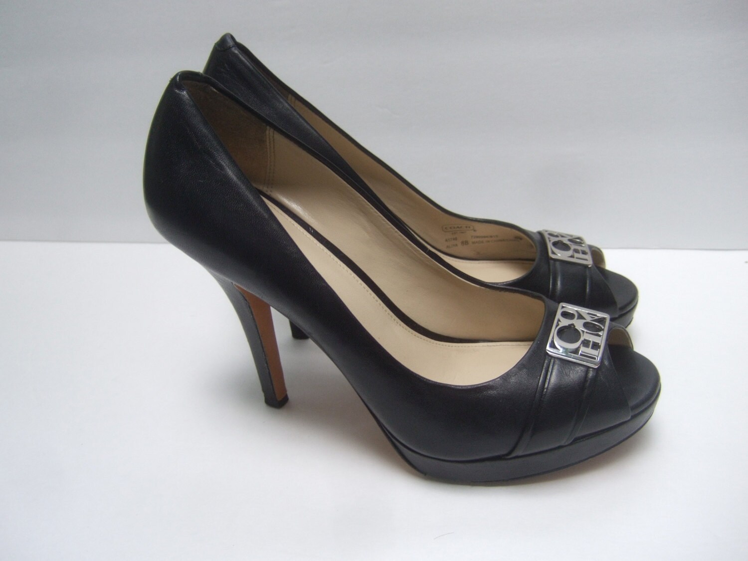 coach black pumps