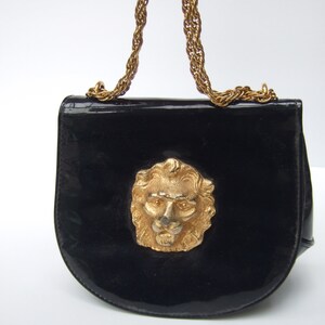 Stylish Small Dark Blue Patent Vinyl Lion Emblem Handbag c 1970s image 7