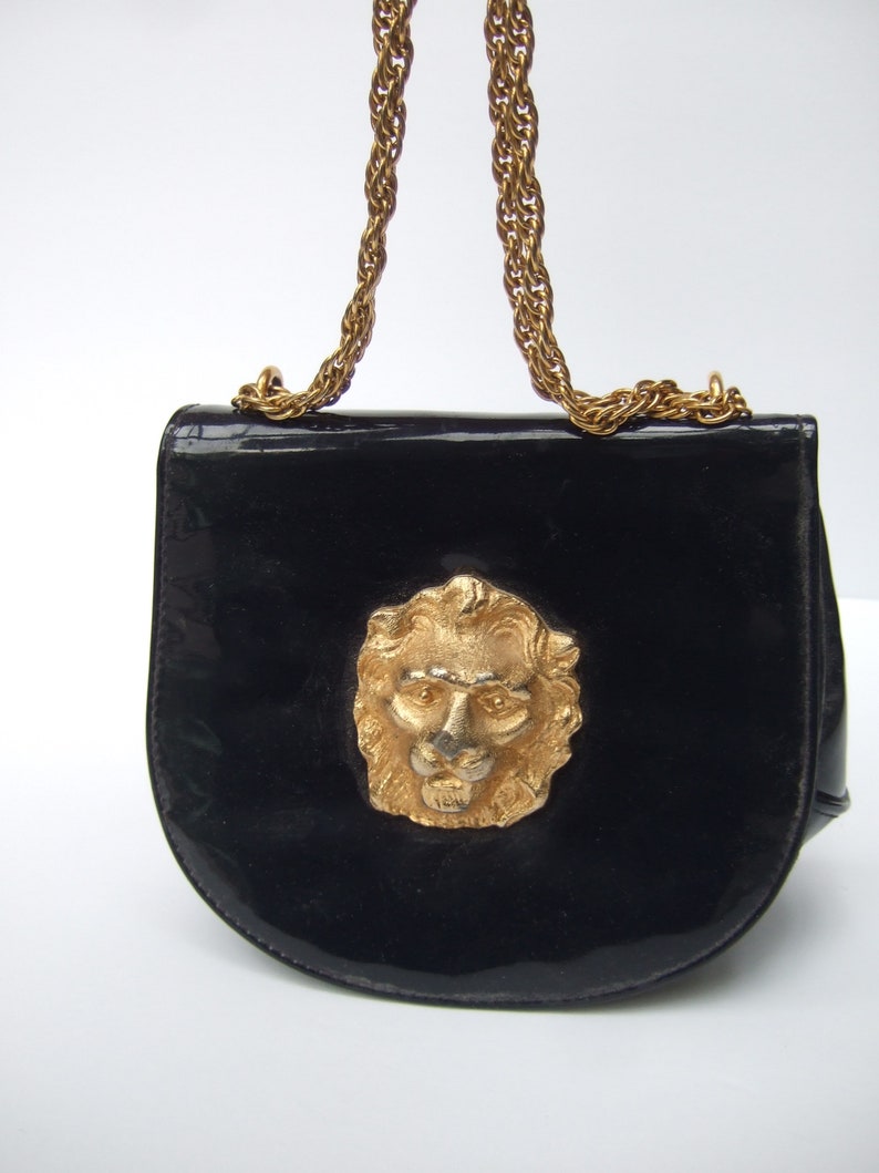 Stylish Small Dark Blue Patent Vinyl Lion Emblem Handbag c 1970s image 7