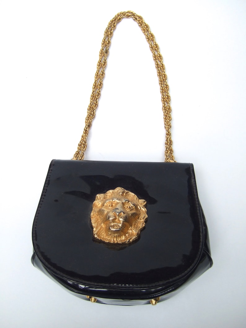 Stylish Small Dark Blue Patent Vinyl Lion Emblem Handbag c 1970s image 5