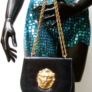 Stylish Small Dark Blue Patent Vinyl Lion Emblem Handbag c 1970s image 2