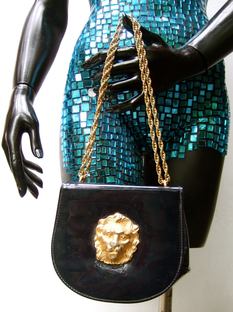 Stylish Small Dark Blue Patent Vinyl Lion Emblem Handbag c 1970s image 2