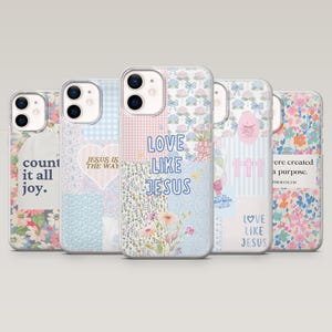 May include: A collection of five phone cases with floral, patchwork, and inspirational designs. The cases feature phrases like "count it all joy," "Jesus is the way," and "Love Like Jesus." The cases have a clear border.
