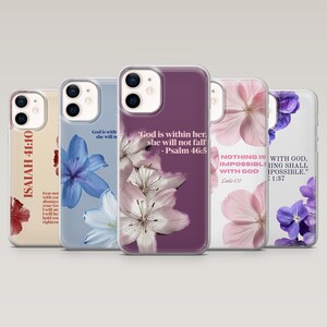 May include: A collection of phone cases with floral designs and inspirational quotes. The cases feature various colors, including beige, blue, purple, and pink. Each case displays a different flower and a Bible verse, such as Isaiah 41:10 and Psalm 46:5.
