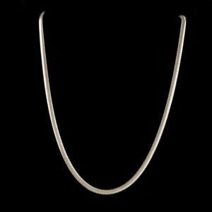 May include: A silver-toned snake chain necklace featuring a smooth, flexible, and continuous interlocking link design. The metallic chain has a polished finish that reflects light along its rounded, tubular surface, forming a simple U-shape.