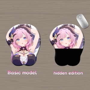 May include: Two ergonomic mouse pads with wrist rests, featuring anime-style illustrations of a character with pink hair and blue eyes. One pad is labeled "Basic model," the other "hidden edition." A silver wireless mouse is also present.
