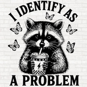 May include: A black and white graphic illustration of a raccoon holding a cup with a straw. The raccoon is surrounded by four butterflies. The text I IDENTIFY AS A PROBLEM is arched above and below the raccoon in a bold black font.