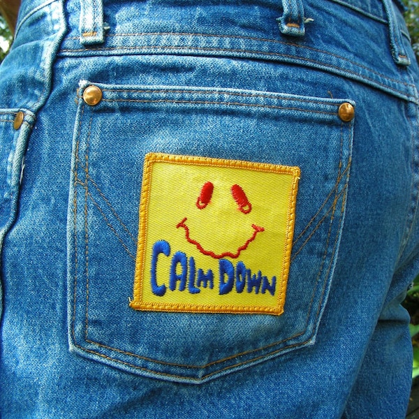 Vintage Wrangler Denim Jeans with Trippy Vintage 70s CALM DOWN Patch Size 35w x 33L