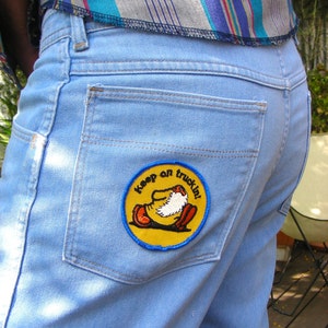 Vintage Wrangler Denim Jeans with Groovy Vintage 70s &quot;Keep On Truckin&quot; Patch Size 36W x 30L