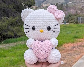 Crochet Hello Kitty Plushie with Heart, Handmade Amigurumi Cat Toy, Cute Kawaii Plush, Finished Soft Velvet Crochet Doll, Gift for Kids