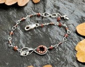 Infinity Bracelet - Sterling Silver Garnet Oak Leaf Bracelet - Autumn Gemstone - Nature inspired Pagan Witch Jewelry - Oxidized Silver 925