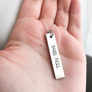 Raise hell necklace | hand stamped vertical bar necklace | personalized jewelry | girl power | feminism | feminist