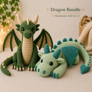 May include: Two handmade crochet dragons. One is upright in green and tan, with large eyes and wings. The other is lying down in shades of green and teal. The text "Dragon Bundle" and "Handmade with love" are also visible.