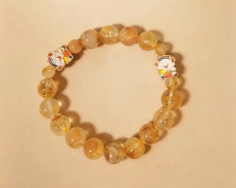 Schwebendes Licht – Citrin-Perlenarmband, goldenes Stretch-Armband aus Naturkristallen, Glücksbringer-Geschenk, Design von Jiegeng