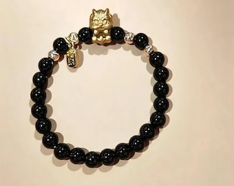 Schwarzes Pixiu-Glücksarmband – Armband aus schwarzem Achat, Feng-Shui-Armband aus Naturstein, dehnbar, mit goldenem Pixiu-Anhänger, Design von Shula