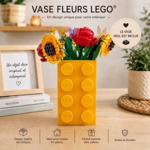 May include: A yellow LEGO brick vase filled with colorful LEGO flowers, including sunflowers and red roses. The vase has the word "LEGO" printed on it. The text "VASE FLEURS LEGO" is at the top of the image.