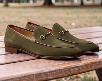 Men's Green Suede Loafers featuring a gold-toned horsebit snaffle trim and minimalist design