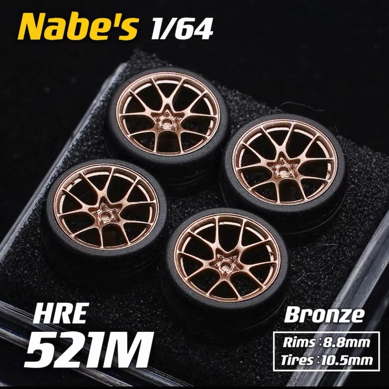 May include: Four bronze-colored model car wheels with black tires. The wheels have a multi-spoke design. The text "Nabe's 1/64", "HRE 521M", and "Bronze" are visible. Rim size is 8.8mm, and tire size is 10.5mm.