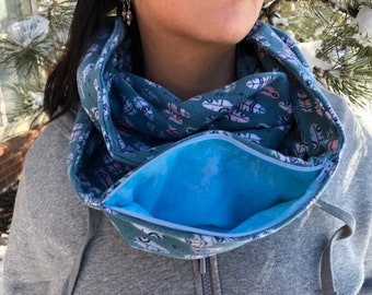 Infinity scarf with blue zipper pocket feather print
