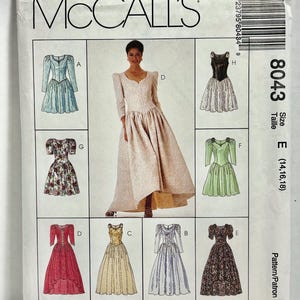 May include: A vintage McCall's sewing pattern envelope. The front features illustrations of various dress designs, including a long, formal gown and several shorter dresses. The envelope is white with the McCall's logo and pattern number 8043.