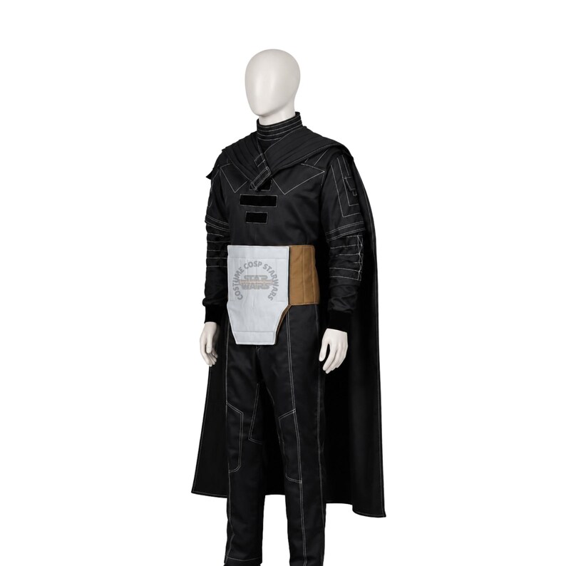 May include: A black long-sleeved costume featuring a high collar, a matching cape, and trousers with white contrast stitching. A light grey and tan rectangular waist panel is attached to the front, displaying the text COSTUME COSP STAR WARS.