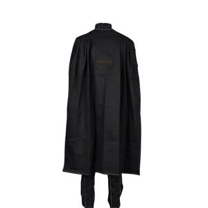 May include: A black floor-length cape with a high collar and white contrast stitching along the edges. The back features a circular embroidered Star Wars logo. The garment is paired with matching black trousers that also display white contrast stitching.