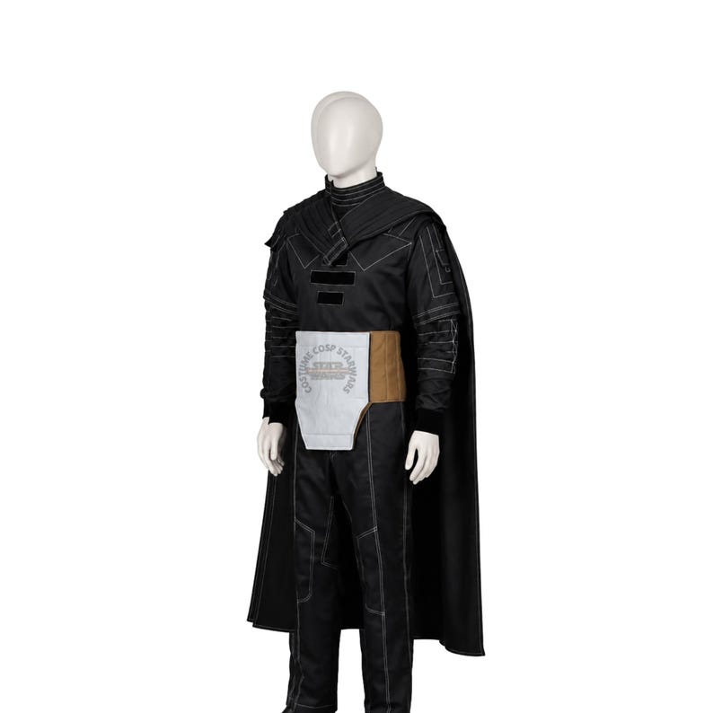 May include: A black costume set featuring a long-sleeved top with white stitching, matching trousers, and a cape. A light grey and tan waist belt is worn over the top, featuring the text "COSTUME COSP STAR WARS" printed on the front panel.