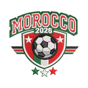 May include: An embroidered patch featuring the text MOROCCO in red with white outlines on a green arched banner. Below, a shield displays a soccer ball, the year 2026, two white stars, a red, green, and white striped background, and three stars.