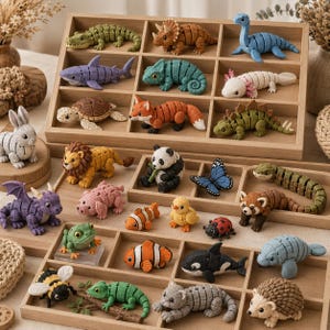 May include: A collection of colorful, handcrafted animal figurines, including a shark, fox, panda, and butterfly, displayed in wooden trays. The figurines are made of textured material and feature detailed designs. The collection includes a variety of animals.
