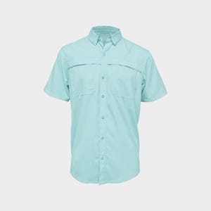 May include: A short-sleeved, light blue shirt with a button-down front, two chest pockets, and a collar. The shirt has a relaxed fit and is made of a lightweight material. The shirt is designed for outdoor activities.