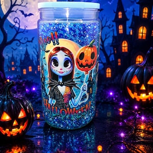 May include: A clear glass jar with a light blue lid filled with blue glitter. The jar features a Halloween-themed graphic of a character holding a pumpkin balloon. The word "Halloween" is printed on the jar.