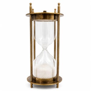 May include: An hourglass featuring a metallic brass frame with a circular top and base, supported by four vertical pillars. The clear glass bulb contains white sand, with the bottom section filled while the top section remains empty.