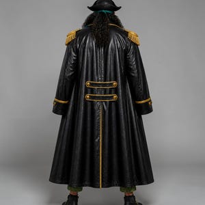 May include: A long black coat with gold trim and epaulets, worn with a black hat. The coat features gold buttons and trim, and is made of a shiny, leather-like material. The outfit is a costume, likely for cosplay or a themed event.