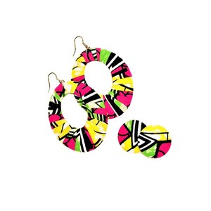May include: A pair of large hoop earrings and a pair of smaller stud earrings. The earrings are made of fabric with a colorful geometric pattern in shades of pink, yellow, green, and black.