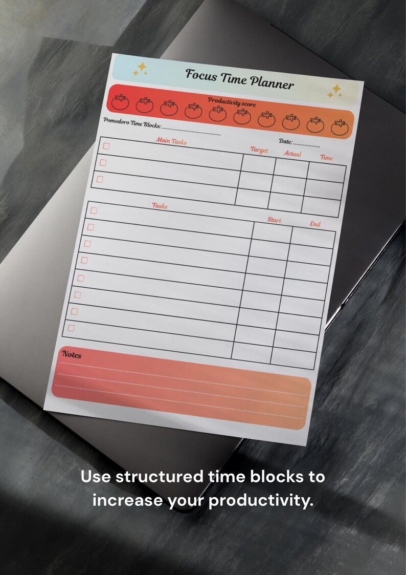 May include: A white Focus Time Planner notepad with a colorful header and footer. The notepad includes sections for Pomodoro time blocks, main tasks, and notes. Text on the notepad reads "Use structured time blocks to increase your productivity."